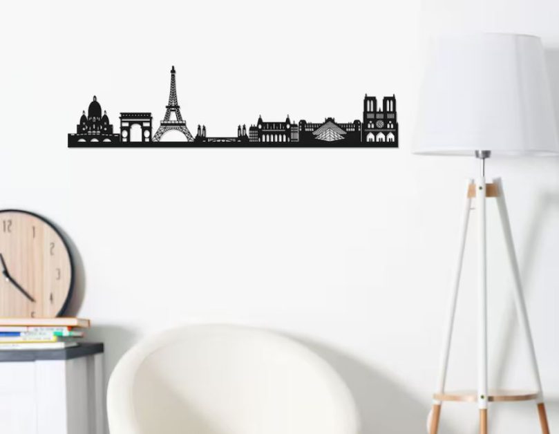 Black metal wall art with the skyline of Paris