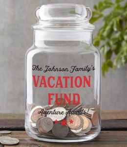 Money jar with text vacation fund