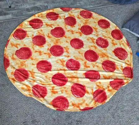 A round pizza-inspired blanket