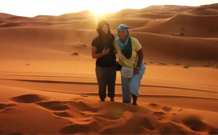 A photo of a daughter and mother in the dessert