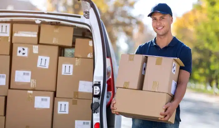 A delivery man with boxes