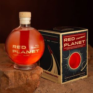A bottle of rum in the shape of a red planet
