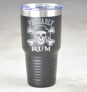 A tumbler with the text "probably rum"