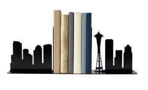 Two metal bookends with the skyline of Seattle