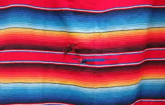 Old blanket with a hole inside