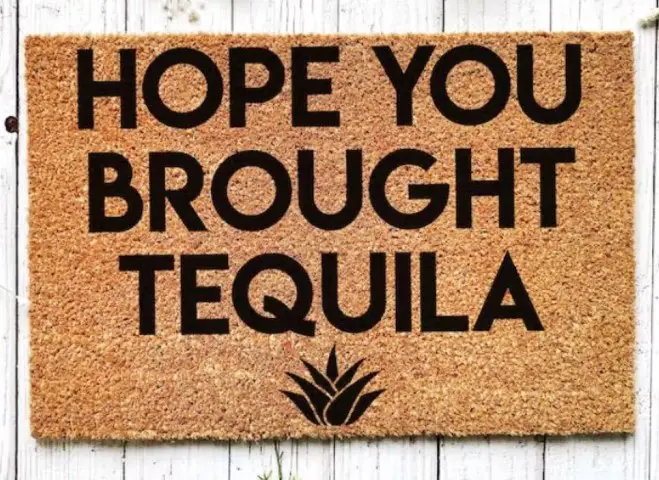Doormat with text; I hope you borught tequila