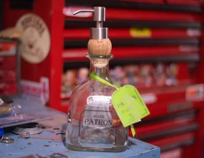 A refurbished Patron tequila bottle to a soap dispenser