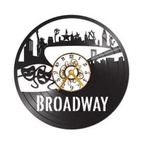 A clock made from an old vinyl record and with typical Broadway symbols