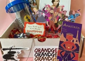 A box filled with items related to the theatre