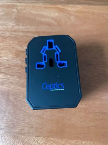 A black travel adapter