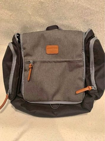 A grey travel toiletery bag for men