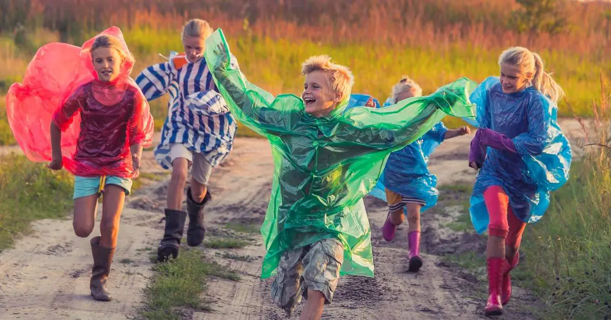 Children running in the rain