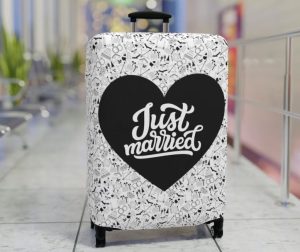 Suitcase cover with "just Married"